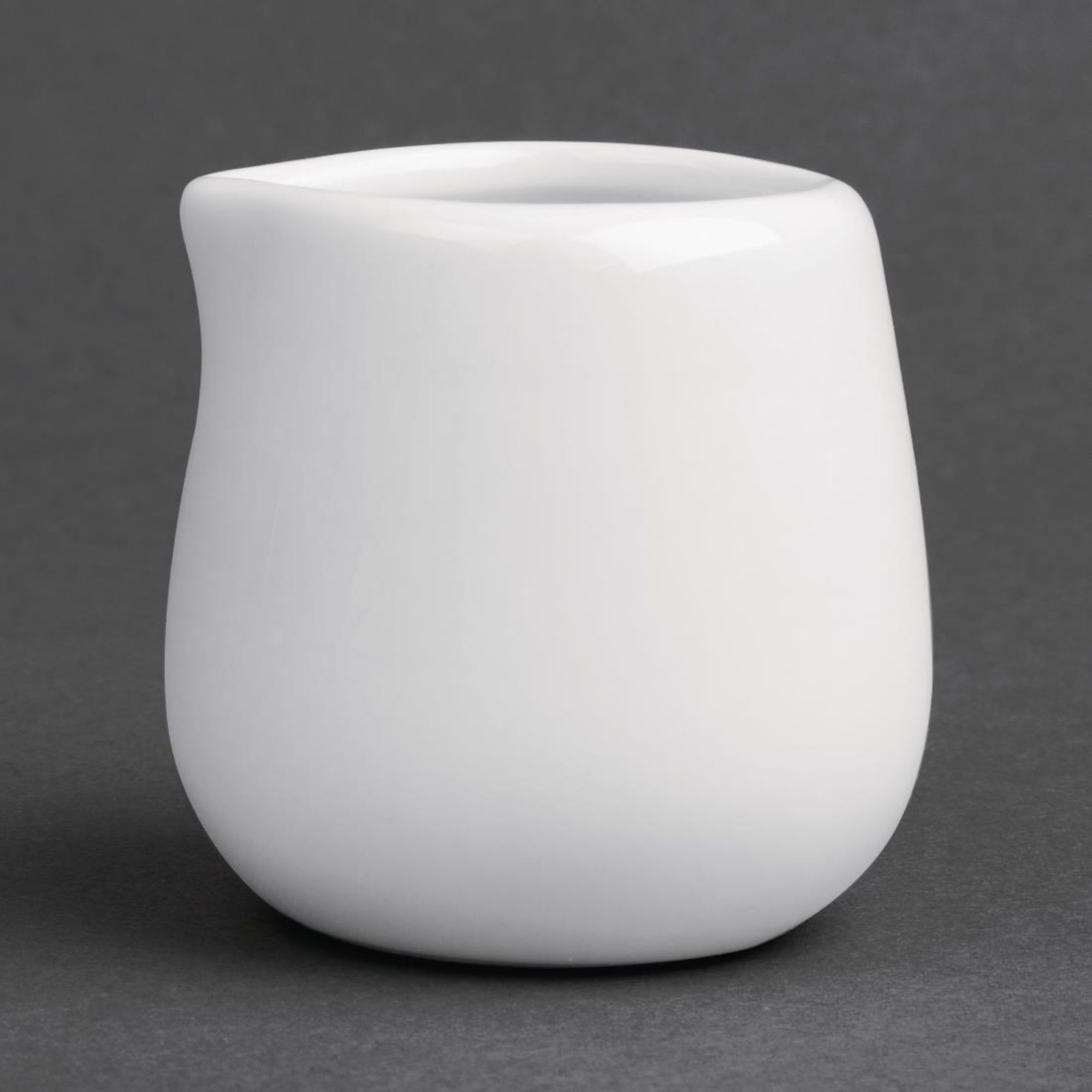 Picture of Olympia Whiteware Compact Jugs 43ml (Pack of 12) - C203OG